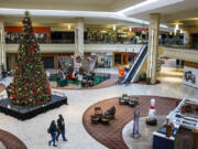 A light turnout of shoppers makes for a slow day for a Santa Claus photo spot at the Puente Hills Mall.