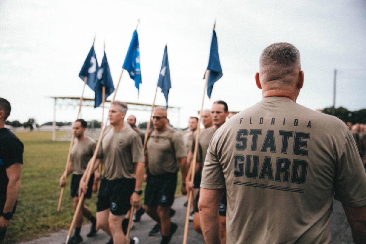 Florida State Guard members are seen in this image from the website of Florida Gov. Ron DeSantis.