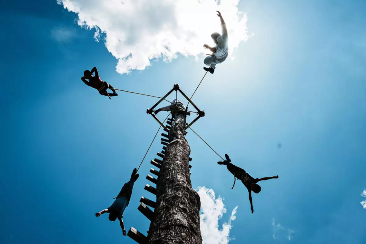 Children learn to fly in free weekly classes offered in Papantla in central Mexico.