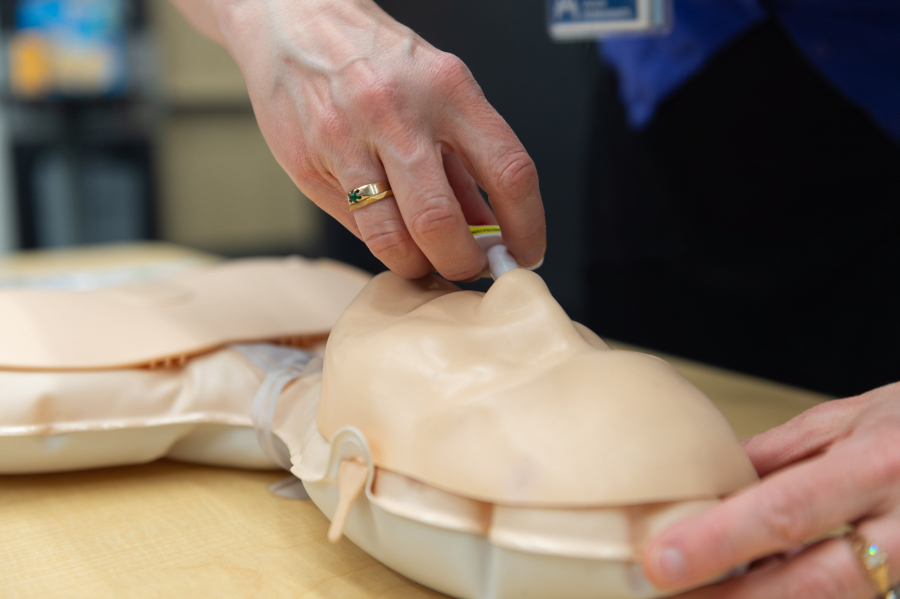 A Clark County Public Health nurse demonstrates how to administer the overdose-reversal drug naloxone. The fentanyl crisis led to an education campaign in schools and elsewhere.