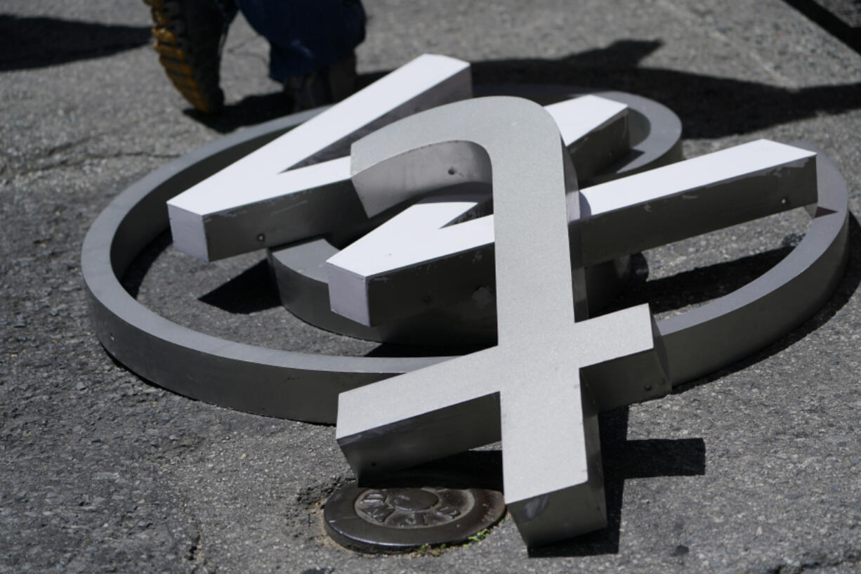 Characters removed from a sign on the Twitter headquarters building are piled on a street in San Francisco on July 24. A little more than a year ago, Elon Musk walked into Twitter&rsquo;s San Francisco headquarters, fired its CEO and other top executives and began transforming the social media platform into what&rsquo;s now known as X. (Godofredo A.