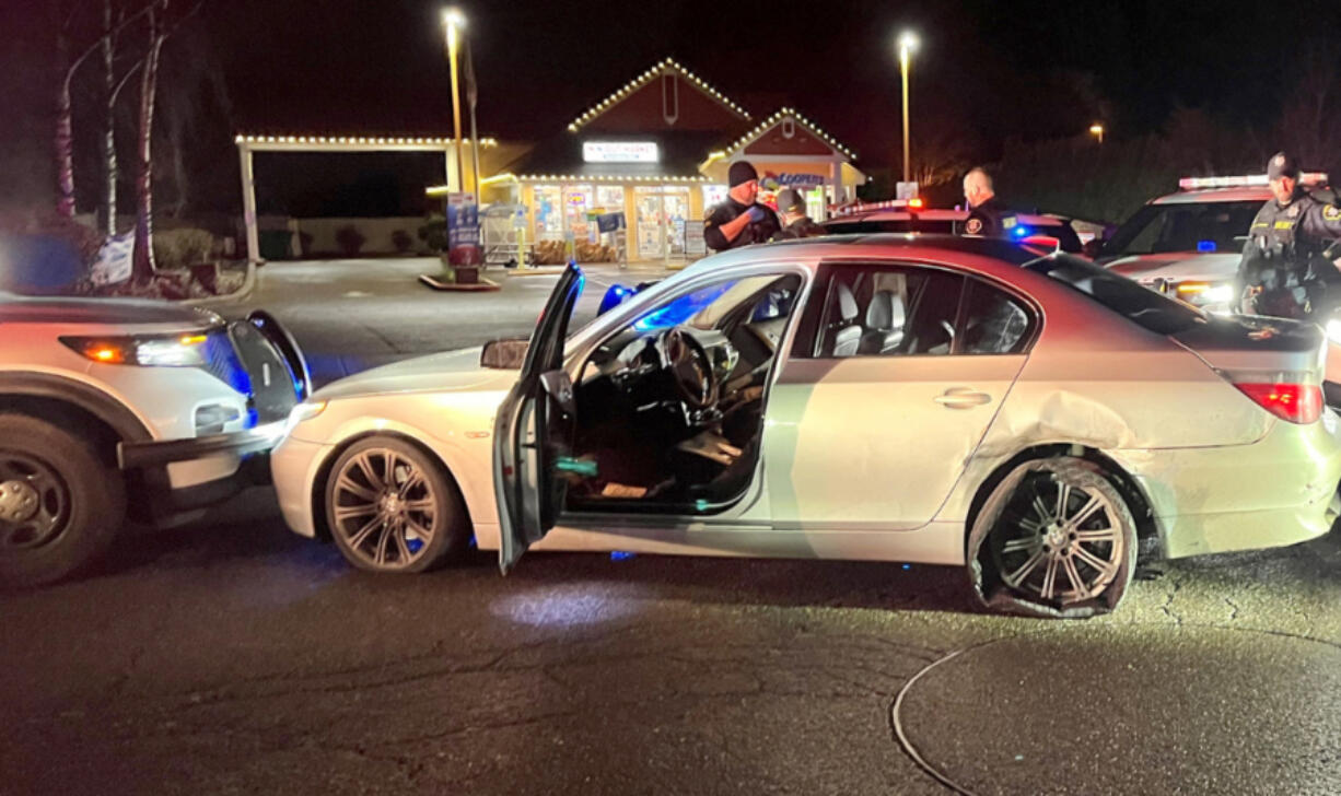 Washington County, Ore., sheriff&rsquo;s deputies pinned a BMW between patrol vehicles after the driver, a 30-year-old Vancouver man, allegedly sped away from police in Astoria, Ore., leading Oregon law enforcement on a chase Friday morning.