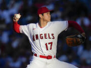 Former Los Angeles Angels starting pitcher Shohei Ohtani agreed Saturday, Dec. 9, to a record $700 million, 10-year contract with the Dodgers.