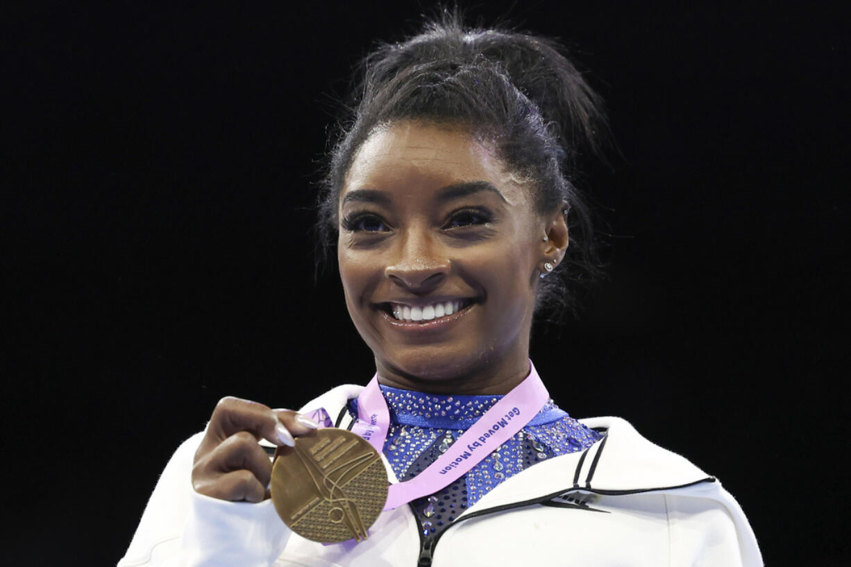 Simone Biles was named the AP Female Athlete of the Year for a third time on Friday, Dec. 22, 2023, after winning national and world all-around titles in her return to gymnastics following a two-year break after the Tokyo Olympics.