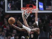 Portland Trail Blazers forward Jerami Grant drives to the basket against the San Antonio Spurs during the second half of an NBA basketball game Friday, Dec. 29, 2023, in Portland, Ore.