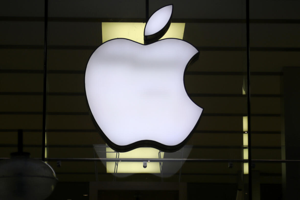 FILE - The Apple logo is illuminated at a store in the city center of Munich, Germany, Dec. 16, 2020. Apple plans to suspend sales of the Series 9 and Ultra 2 versions of its popular Apple Watch for online U.S. customers beginning Thursday afternoon, Dec. 21, 2023, and in its stores on Sunday, Dec. 24. The move stems from an October decision from the International Trade Commission restricting Apple&rsquo;s watches with a Blood Oxygen feature as part of an intellectual property dispute with medical technology company Masimo.