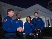 Artemis II crew members from left, Reid Wiseman, Victor Glover, Christina Hammock Koch, and Jeremy Hansen speak to members of the media outside the West Wing of the White House in Washington, Thursday, Dec. 14, 2023, after meeting with President Joe Biden.