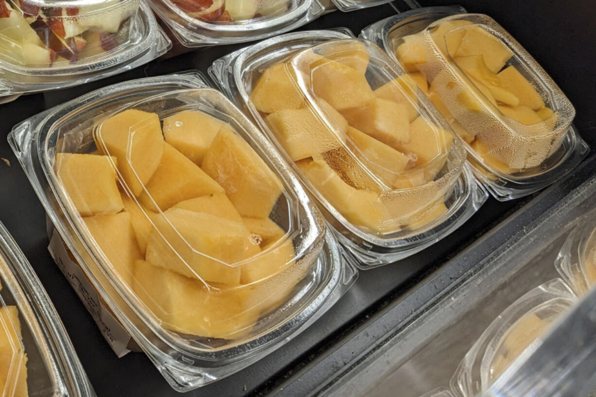 Cut cantaloupe is displayed for sale at a supermarket in Philadelphia on Sunday, Dec. 3, 2023. On Thursday, Dec. 7, 2023, U.S. and Canadian officials reported additional deaths and illnesses in a salmonella outbreak tied to tainted cantaloupe.