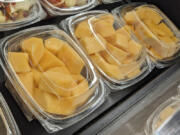 Cut cantaloupe is displayed for sale at a supermarket in Philadelphia on Sunday, Dec. 3, 2023. On Thursday, Dec. 7, 2023, U.S. and Canadian officials reported additional deaths and illnesses in a salmonella outbreak tied to tainted cantaloupe.