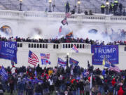 FILE - Rioters at the U.S. Capitol on Jan. 6, 2021, in Washington.  Frank Rocco Giustino, who skipped court hearings, profanely insulted a prosecutor and berated a federal judge, has been sentenced to three months behind bars for joining the mob that attacked the U.S. Capitol on Jan. 6, 2021.