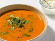 This image released by Milk Street shows a recipe for Indian-style tomato-ginger soup.