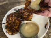 Serve ginger sweet potato pancakes with applesauce.