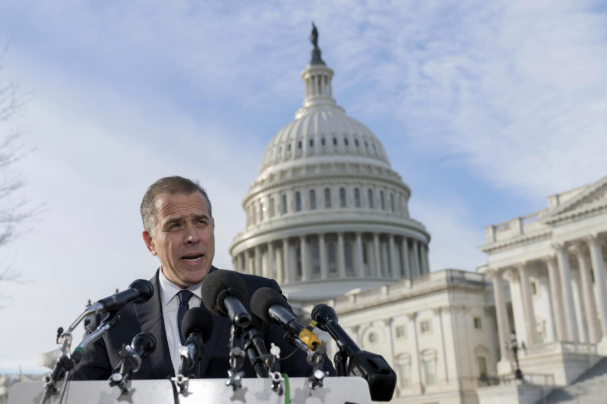 Hunter Biden, son of President Joe Biden, talks to reporters at the U.S. Capitol, in Washington, Wednesday, Dec. 13, 2023. Hunter Biden lashed out at Republican investigators who have been digging into his business dealings, insisting outside the Capitol he will only testify before a congressional committee in public.