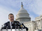 Hunter Biden, son of President Joe Biden, talks to reporters at the U.S. Capitol, in Washington, Wednesday, Dec. 13, 2023. Hunter Biden lashed out at Republican investigators who have been digging into his business dealings, insisting outside the Capitol he will only testify before a congressional committee in public.