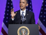 President Barack Obama gestures as he speaks at the 2012 American Society of News Editors annual convention in Washington, D.C. ASNE, which later joined with Associated Press Managing Editors, is disbanding.