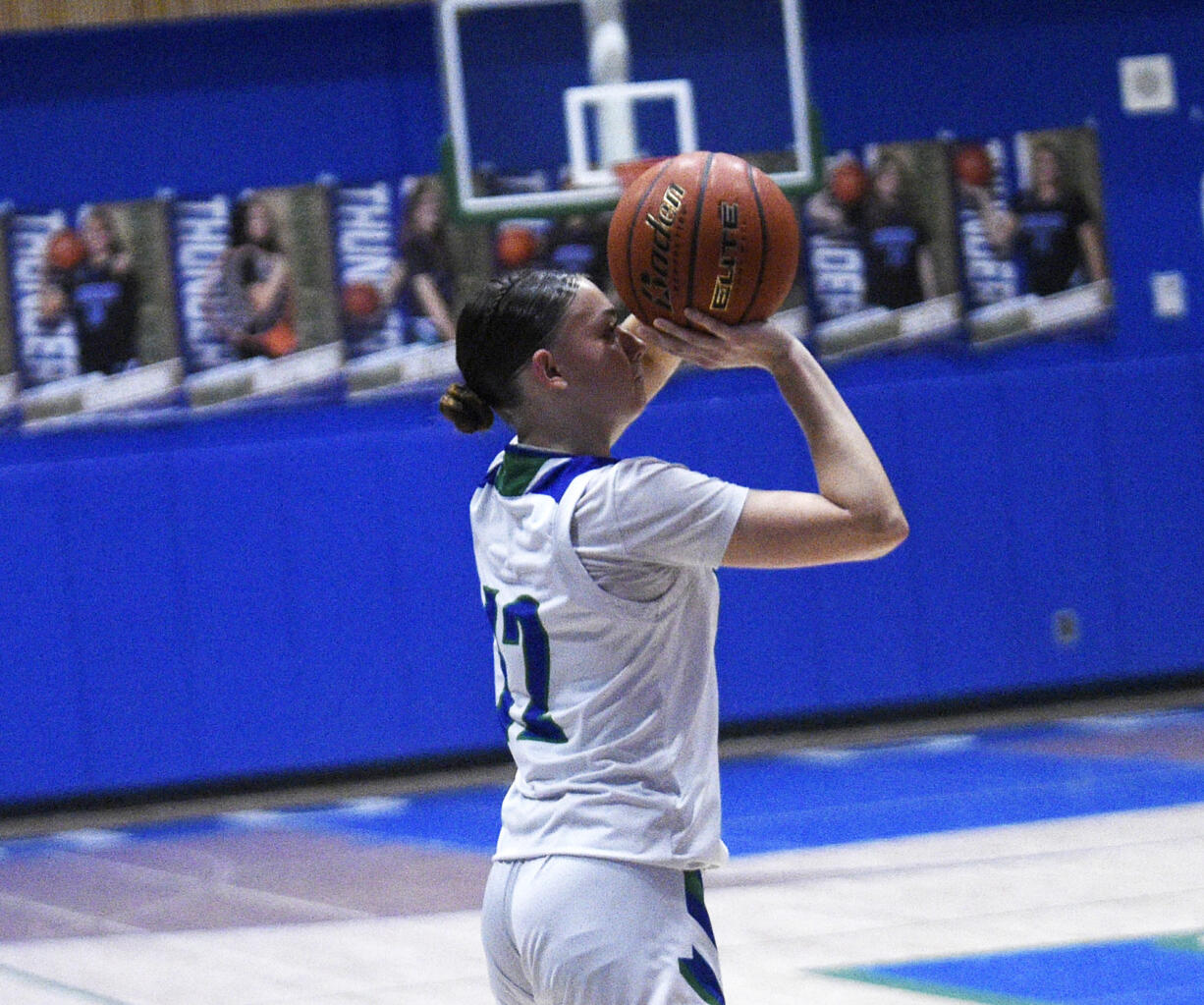 Mountain View's Nina Peterson takes a shot against Kelso during a 3A Greater St. Helens League girls basketball game at Mountain View High School on Monday, Dec. 11, 2023.