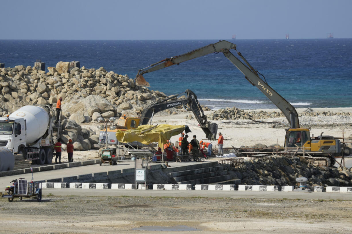 Construction continues at the Philippine-occupied Thitu island, locally called Pag-asa island, on Friday, Dec. 1, 2023 at the disputed South China Sea. The Philippine coast guard inaugurated a new monitoring base Friday on a remote island occupied by Filipino forces in the disputed South China Sea as Manila ramps up efforts to counter China&rsquo;s increasingly aggressive actions in the strategic waterway.