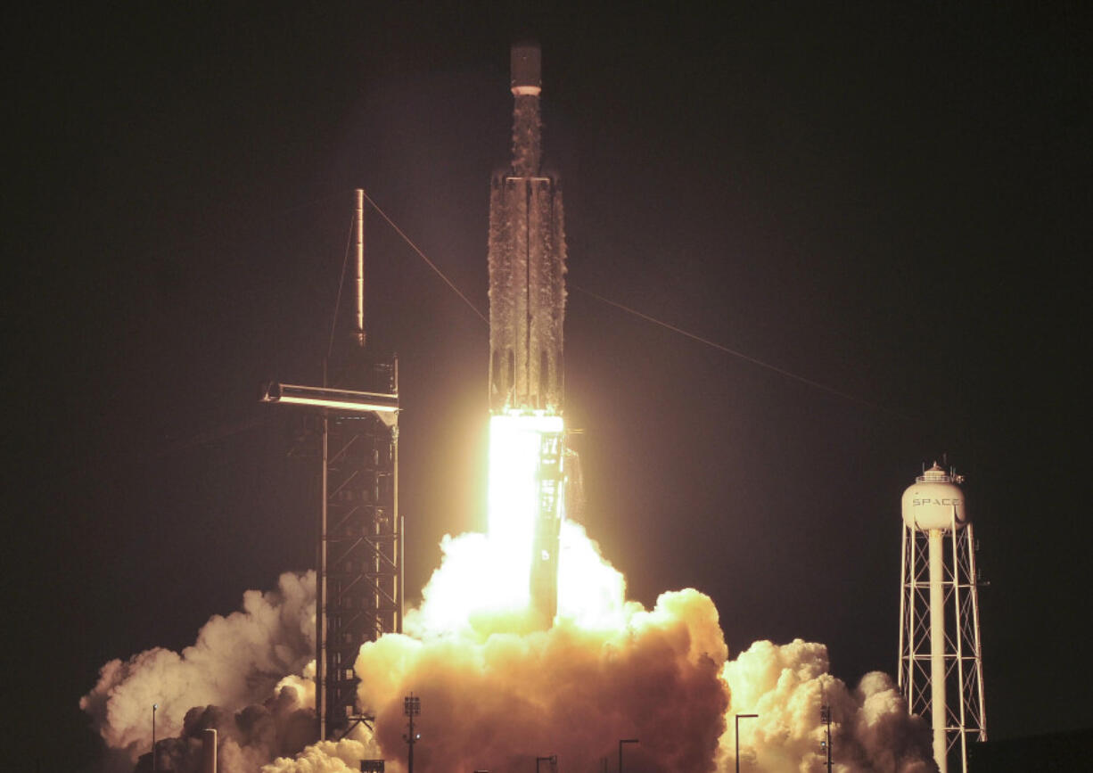 A SpaceX Falcon Heavy rocket lifts off from Kennedy Space Center at Cape Canaveral, Fla., Thursday, Dec. 28, 2023. The rocket was carrying the U.S. military&rsquo;s X-37B secret space plane.