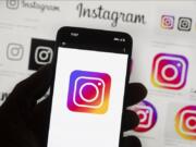 The Instagram logo is seen on a cellphone, Oct. 14, 2022, in Boston.