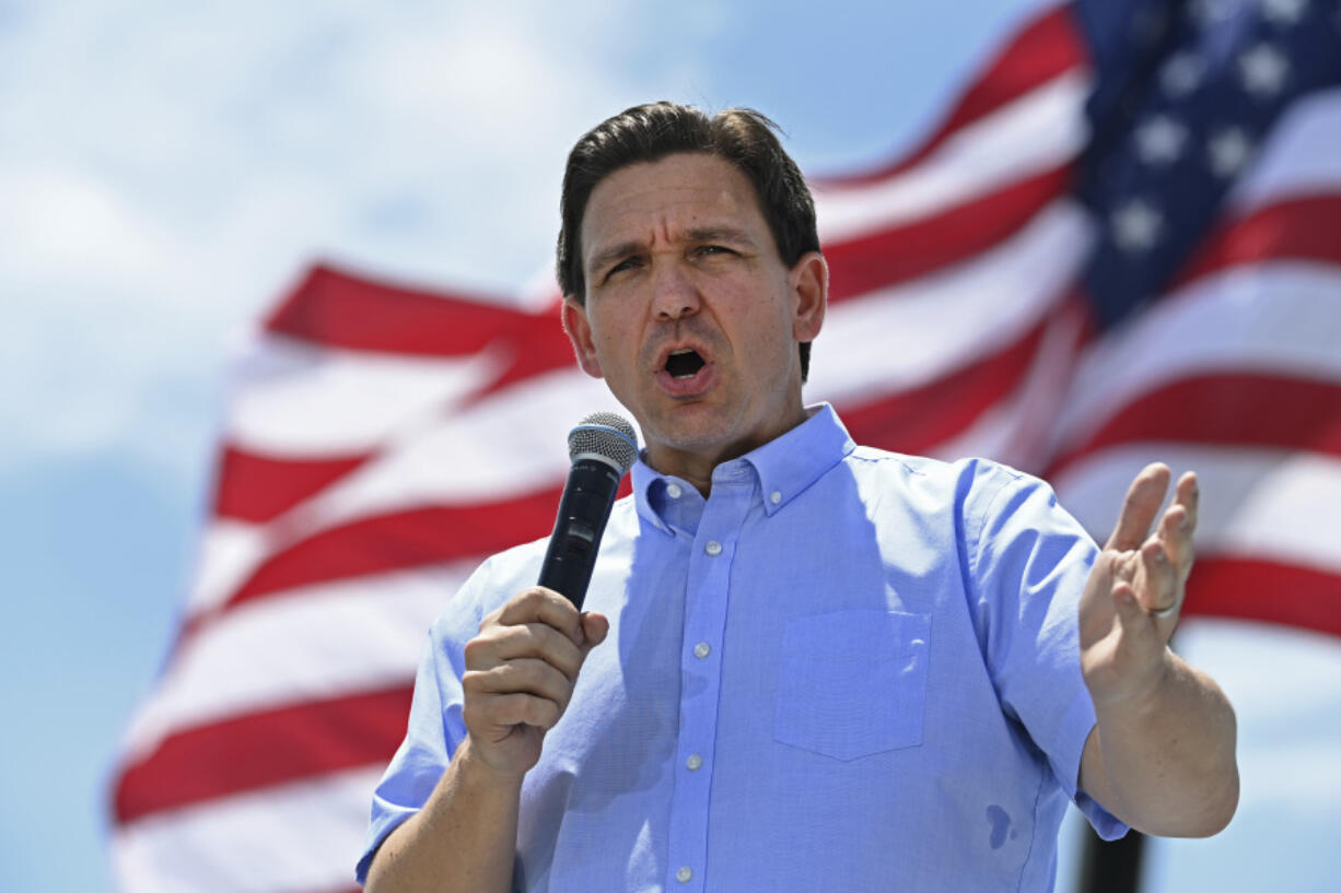 FILE - Republican presidential candidate and Florida Gov. Ron DeSantis speaks at an annual Basque Fry at the Corley Ranch in Gardnerville, Nev., Saturday, June 17, 2023. The mother of a transgender girl sobbed in federal court Wednesday, Dec. 13, 2023, as she contemplated having to move away from her Navy officer husband to get health care for her 12-year-old if Florida&rsquo;s ban on gender dysphoria treatments for minors is allowed to take affect.