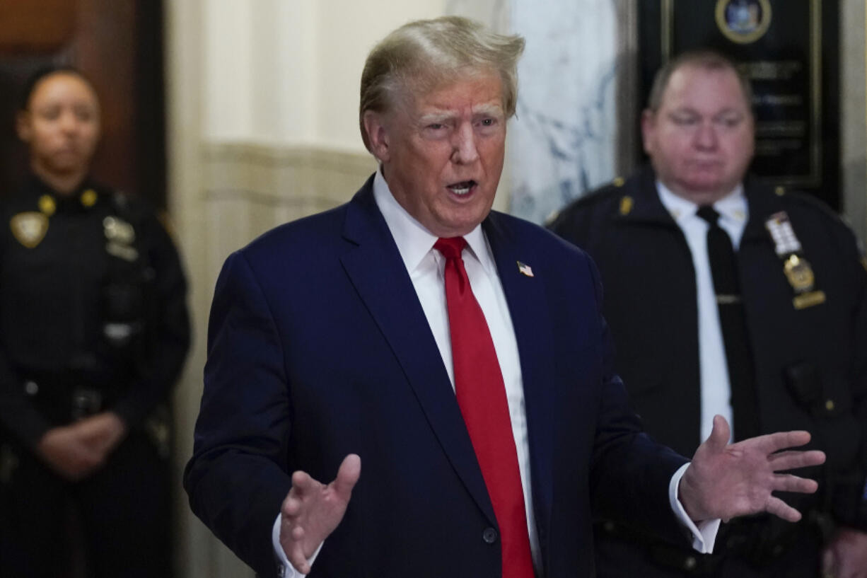 Donald Trump speaks after arriving at New York Supreme Court, Thursday, Dec. 7, 2023, in New York.