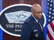 Chairman of the Joint Chiefs of Staff Air Force Gen. CQ Brown, enters the Press Briefing Room to participate in a virtual Ukraine Defense Contact Group (UDCG) meeting, Wednesday, Nov. 22, 2023, at the Pentagon in Washington.