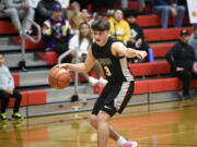 Grayson Stanley of Union directs the offense against Puyallup in the Myron Lawrence Memorial Tournament at Fort Vancouver High School on Thursday, Dec. 28, 2023.