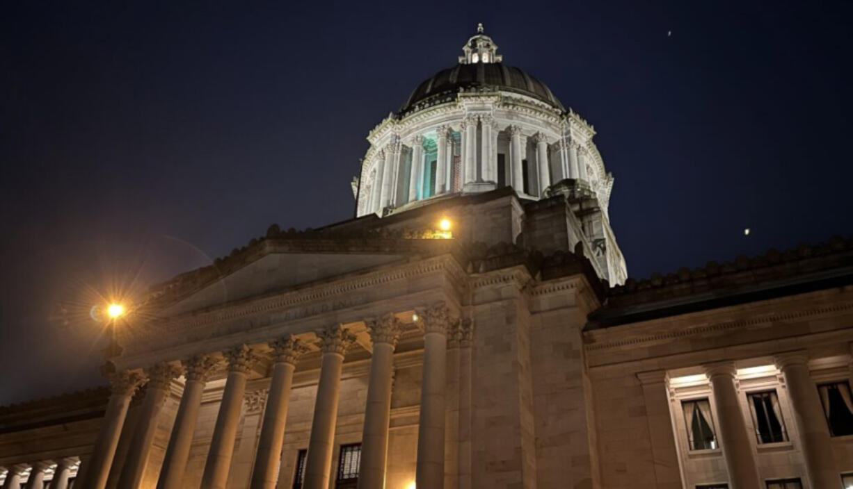 Washington State Legislative Building at night.