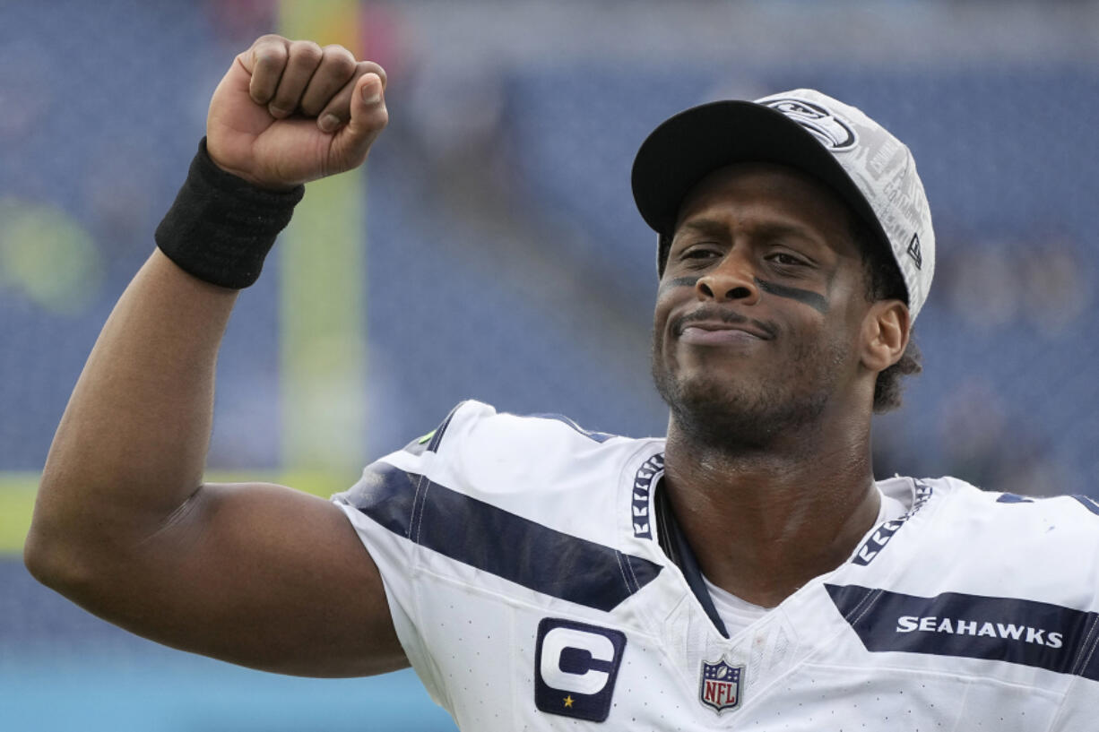 Seattle Seahawks quarterback Geno Smith celebrates after the Seahawks defeated the Tennessee Titans in an NFL football game on Sunday, Dec. 24, 2023, in Nashville, Tenn.