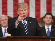 U.S. President Donald J. Trump (center) delivers his first address to a joint session of the U.S. Congress as U.S. Vice President Mike Pence (left) and Speaker of the House Paul Ryan (right) listen on Feb. 28, 2017, in the House chamber of the U.S. Capitol in Washington, DC. Trump&rsquo;s first address to Congress is expected to focus on national security, tax and regulatory reform, the economy, and healthcare.