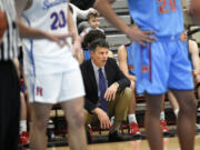 Mark Morris head coach Bill Bakamus watches the action during a 2A Greater St. Helens League boys basketball game against Ridgefield at Mark Morris High School on Saturday, January 20, 2024.