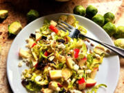 Shaved Brussels sprouts team up with chopped apple and a citrusy dressing in this healthful salad.