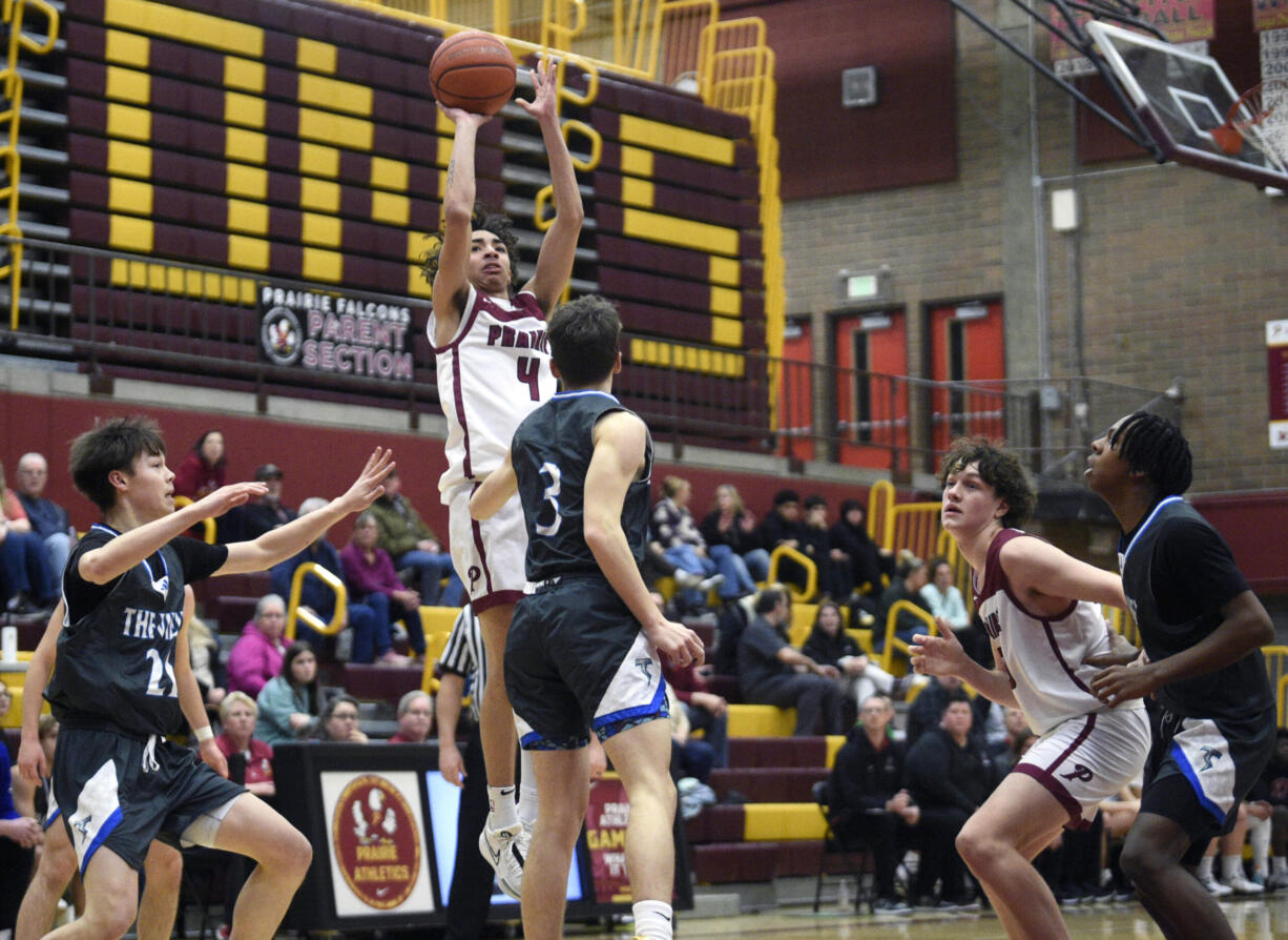 Prairie’s Malachi Patton (4) shoots over Mountain View during a 3A GSHL boys basketball game on Wednesday, Jan. 24, 2023, at Prairie High School.