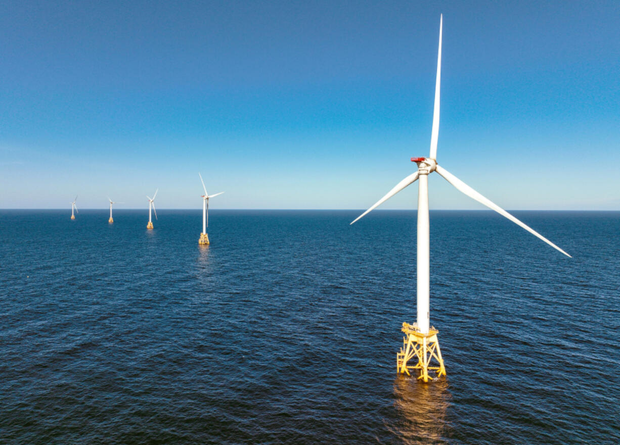 In an aerial view, wind turbines generate electricity at the Block Island Wind Farm on July 7, 2022, near Block Island, Rhode Island.