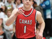 Camas junior Beckett Currie points during pregame introductions Tuesday, Jan. 2, 2024, during the Papermakers’ 71-33 win against Union at Union High School.