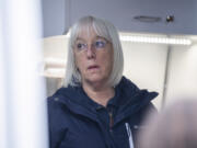 U.S. Sen. Patty Murray, center, listens, during a Wednesday tour of the Cowlitz Indian Tribe's new medication-assisted treatment van.