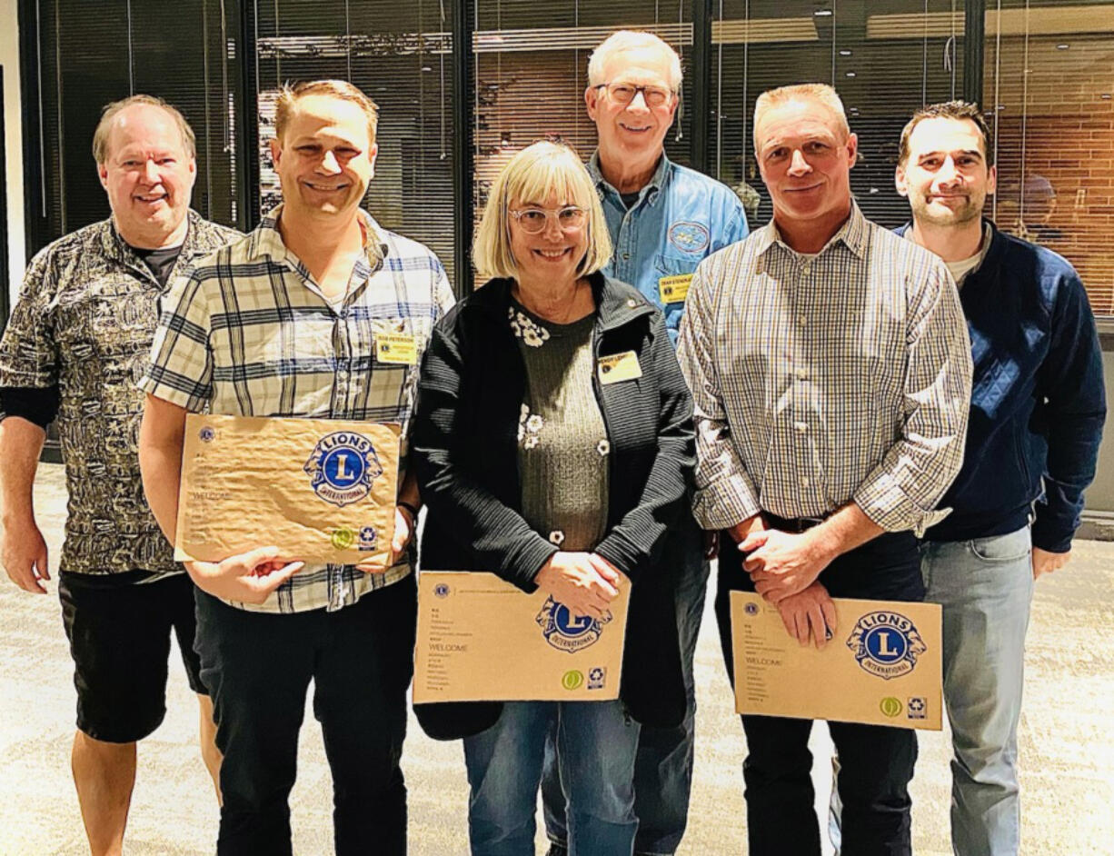 The Ridgefield Lions Club recently welcomed three new members. Back row from left: Lions sponsors Don Lasher, Dean Stenehjem, and Stuart Eggertsen.