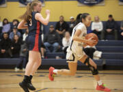 Madison Lee (1) of Seton Catholic (right) heads down the court with King’s Way’s Bridget Quinn (3) just behind her 4during a Trico League girls basketball game at Seton Catholic High School on Thurs. Jan. 11, 2024. Seton Catholic defeated King's Way 36-22.