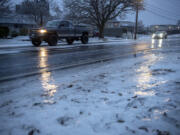 Motorists in southeast Vancouver carefully drive along icy roads Wednesday morning.
