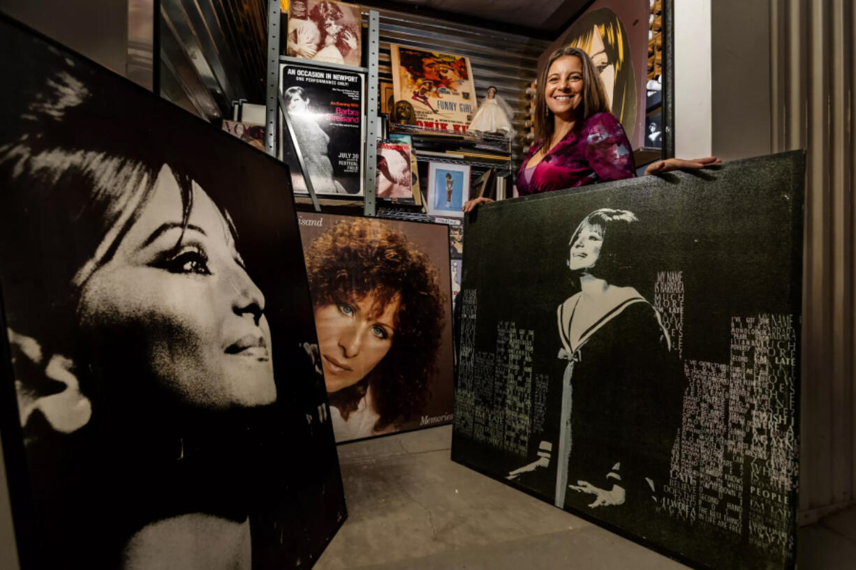 Mara Papalas stands inside one of the six storage units that her father filled with Barbra Streisand memorabilia.