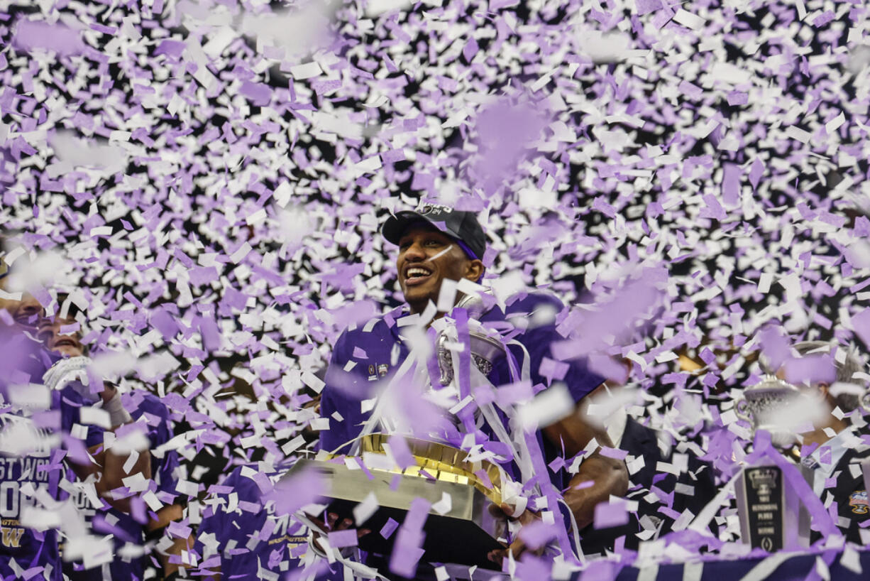 Washington quarterback Michael Penix Jr. celebrates after the Sugar Bowl CFP NCAA semifinal college football game between Washington and Texas, Tuesday, Jan. 2, 2024, in New Orleans. Washington won 37-31.