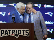 New England Patriots team owner Robert Kraft, left, and former Patriots head coach Bill Belichick embrace during an NFL football news conference, Thursday, Jan. 11, 2024, in Foxborough, Mass., to announce that Belichick, a six-time NFL champion, has agreed to part ways with the team.