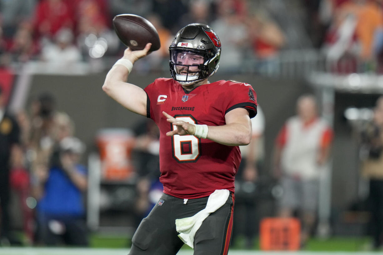 Tampa Bay Buccaneers quarterback Baker Mayfield throws a pass against the Philadelphia Eagles during the first half of an NFL wild-card playoff football game, Monday, Jan. 15, 2024, in Tampa, Fla.