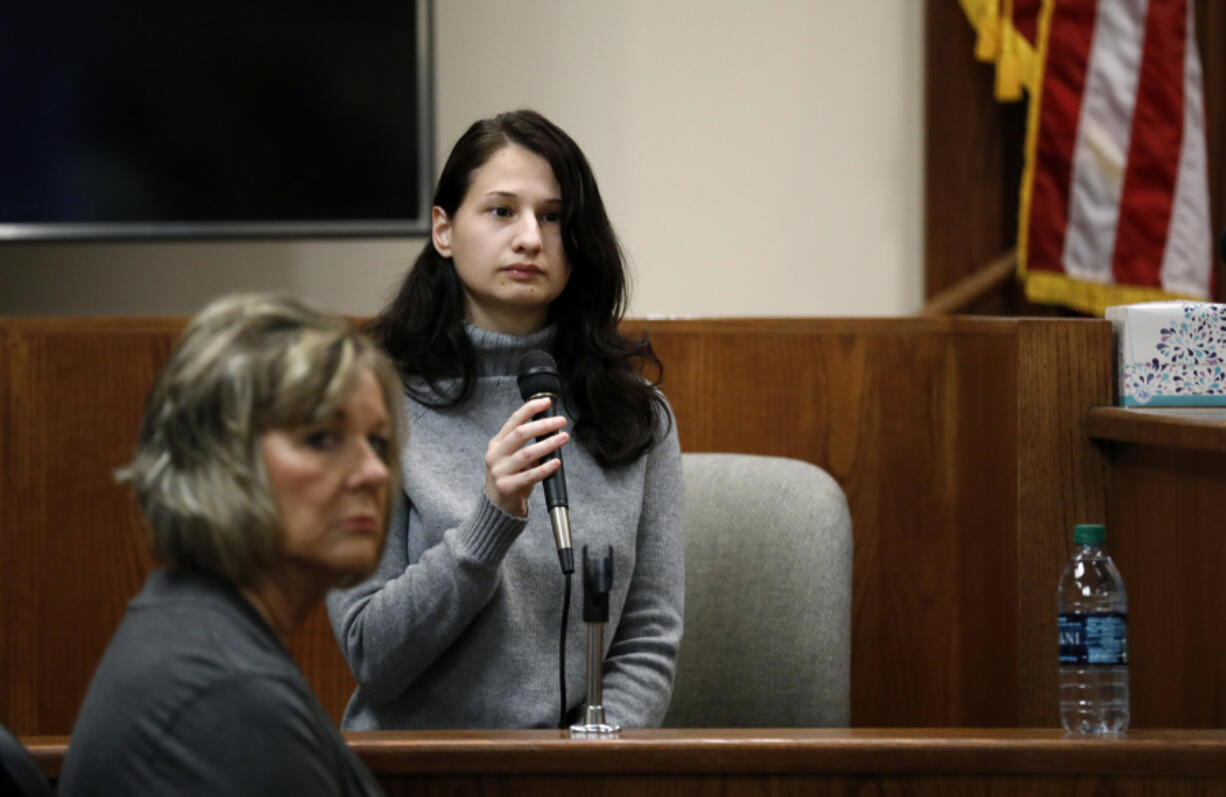 FILE - Gypsy Rose Blanchard takes the stand during the trial of her ex-boyfriend Nicholas Godejohn, Nov. 15, 2018, in Springfield, Mo. Blanchard, the Missouri woman who admitted to convincing her online boyfriend to kill her abusive mother after being forced to pretend for years she was suffering from leukemia, muscular dystrophy and other serious illnesses, said she has found a way to forgive her mother &mdash; and herself. But it has been a long journey from years of abuse and the darkest parts of her life splashed across tabloids to living in prison.