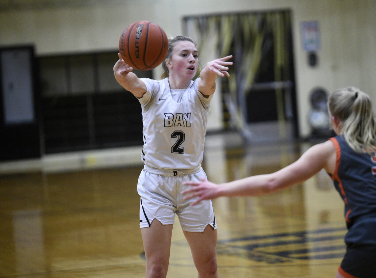 Promise Bond of Hudson’s Bay makes a pass during a 2A Greater St. Helens League girls basketball game at Hudson’s Bay High School on Monday, Jan. 29, 2024.