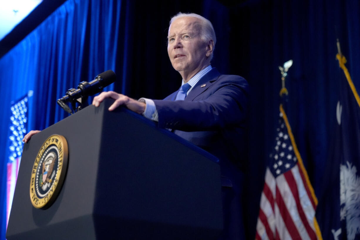 FILE - President Joe Biden speaks at South Carolina&rsquo;s First in the Nation dinner at the South Carolina State Fairgrounds in Columbia, S.C., Jan. 27, 2024. The Biden administration will start implementing a new requirement that the developers of major artificial intelligence systems disclose their safety test results to the government.