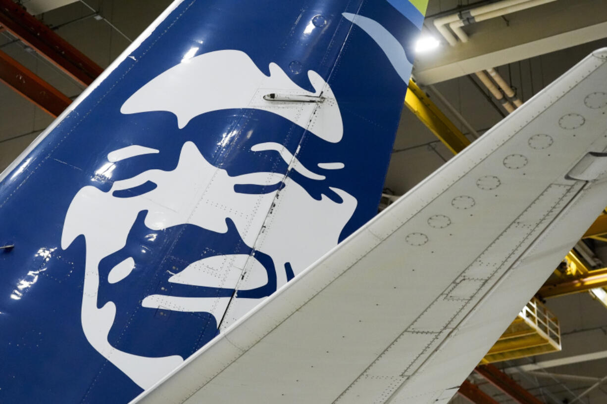 An Alaska Airlines aircraft sits in the airline&#039;s hangar at Seattle-Tacoma International Airport Wednesday, Jan. 10, 2024, in SeaTac, Wash.