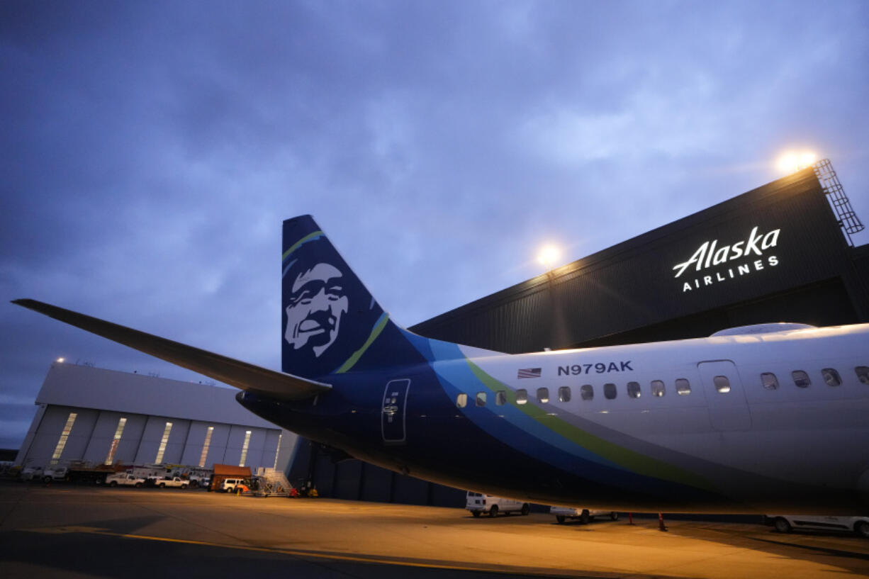 File - An Alaska Airlines Boeing 737 Max 9 awaits inspection at the airline&rsquo;s hangar at Seattle-Tacoma International Airport onJan. 10, 2024, in SeaTac, Wash. Boeing 737 Max 9 jetliners will carry passengers in the United States again, starting this weekend, for the first time since they were grounded after a panel blew out of the side of one of the planes.