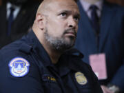 FILE - U.S. Capitol Police Sgt. Harry Dunn listens as the House select committee investigating the Jan. 6 attack on the U.S. Capitol holds its final meeting on Capitol Hill in Washington, Monday, Dec. 19, 2022. Dunn, who defended the U.S. Capitol on Jan. 6 announced Wednesday, Jan. 3, 2024 he is running for Congress in Maryland.