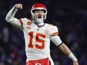 Kansas City Chiefs quarterback Patrick Mahomes (15) reacts after beating the Buffalo Bills in an NFL AFC division playoff football game, Sunday, Jan. 21, 2024, in Orchard Park, N.Y.